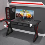 طاولة كمبيوتر قيمنق علي شكل حرف اكس مميزة