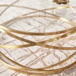 ⁦طاولة قهوة دائرية بتصميم ملتف وسطح زجاجي⁩ - الصورة ⁦5⁩