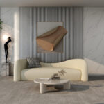 ⁦اريكة مخملية بتصميم انحنائي⁩ - الصورة ⁦2⁩