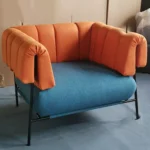 كرسي مفرد من القماش والمعدن