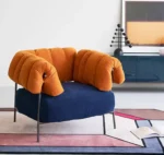 كرسي مفرد من القماش والمعدن