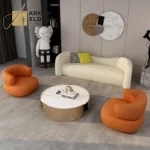 كنب مخملي بتصميم انحنائي