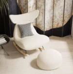 كرسي هزاز علي شكل سمكة مع مسند قدم