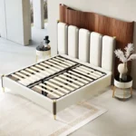 سرير من الجلد الفاخر بارجل ذهبية