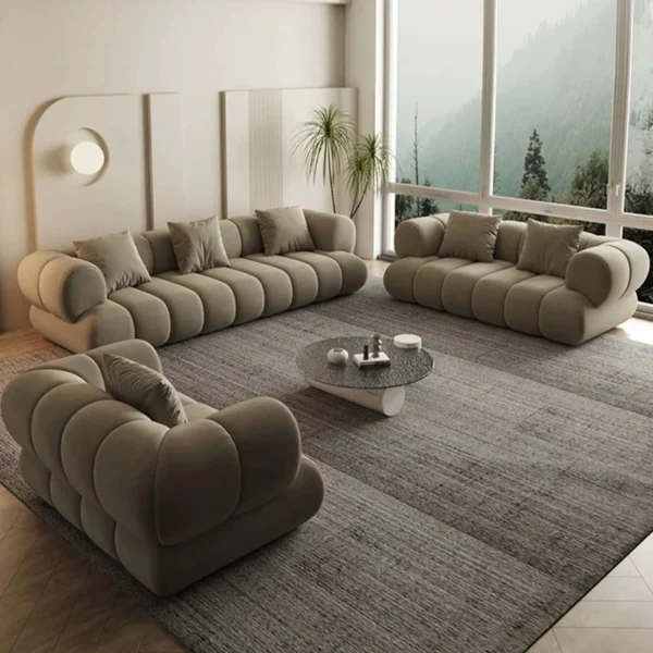 كنب بتصميم هندسي أنيق – راحة فائقة وتنجيد فاخر – لمسة فخمة لغرفة المعيشة العصرية