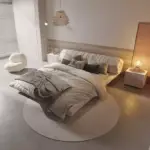 سرير غرفة نوم مع كمودينة بتصميم مميز