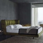 سرير بتصميم حديث مغطي بالقماش