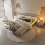 سرير غرفة نوم مع كمودينة بتصميم مميز