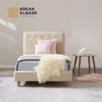 سرير أطفال مفرد مبطن بتصميم أنيق