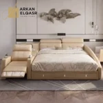 سرير مع كرسي وخزانات متعددة